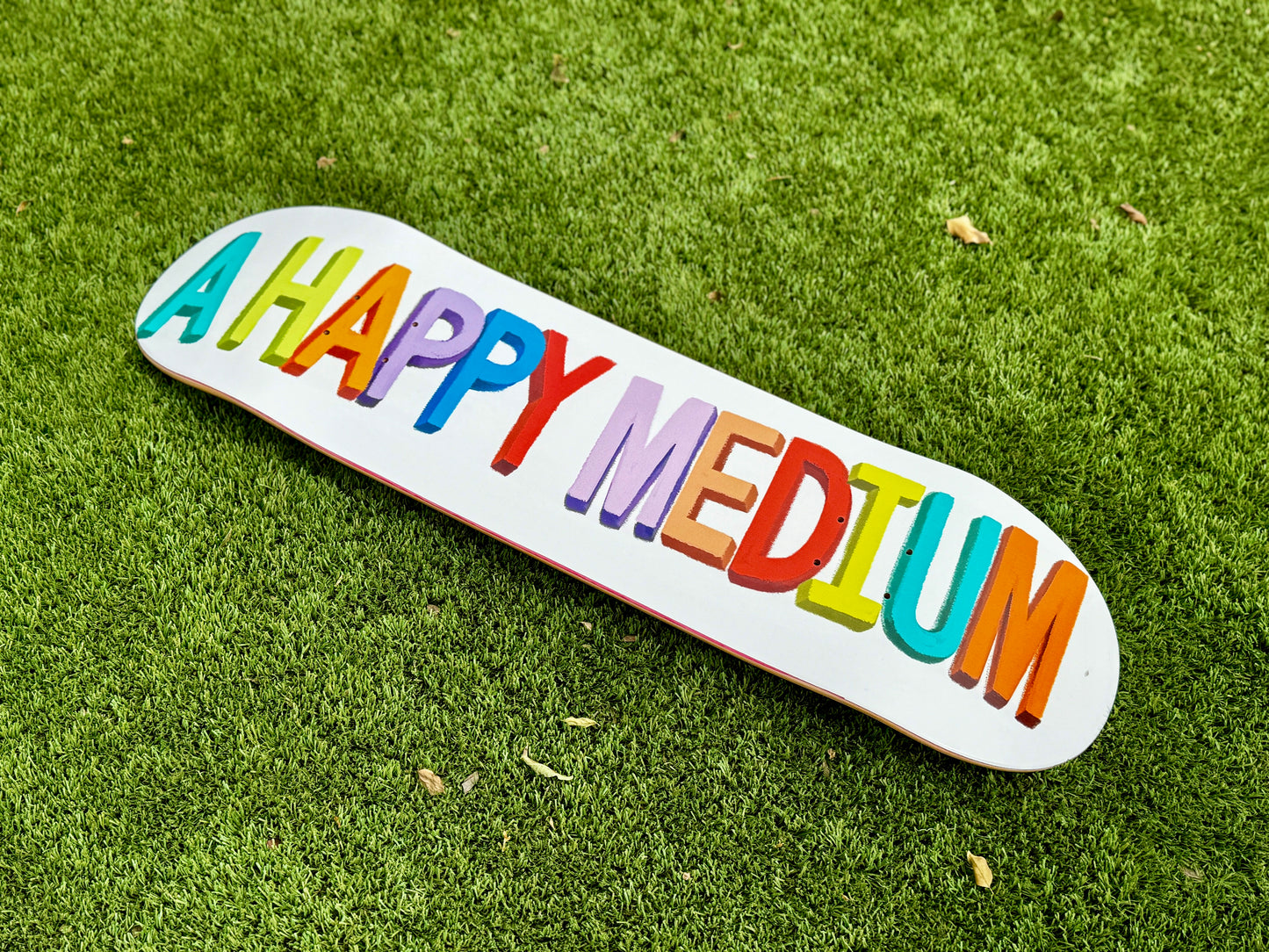 "A HAPPY MEDIUM" Logo Deck